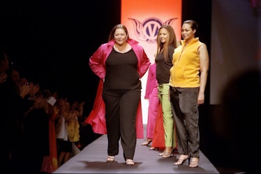 Camryn Manheim (left) with models on runway at end of the La