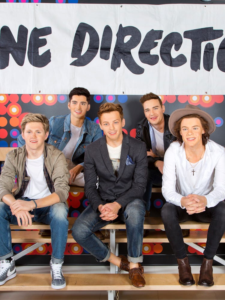 Niall Horan, Zayn Malik, Louis Tomlinson, Liam Payne, and Harry Styles wax figures at Madame Tussaud...