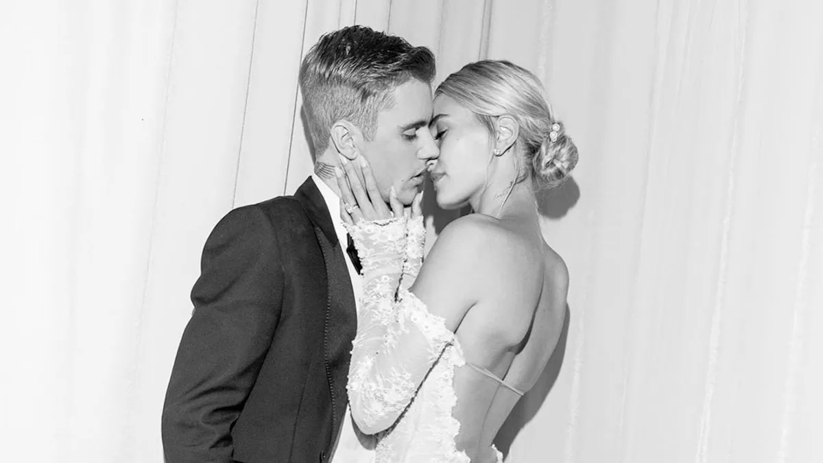 who designed hailey bieber wedding dress Hailey Bieber's stunning off-the-shoulder wedding dress designed by the late Virgil Abloh : r/whatthefrockk