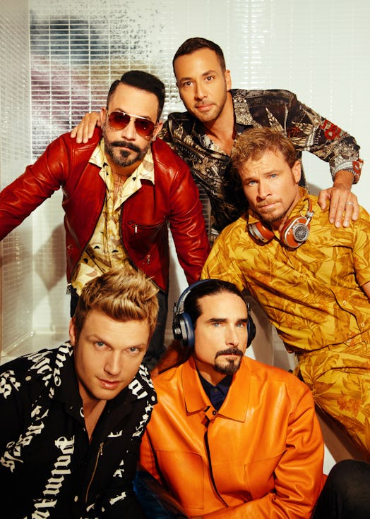 The Backstreet Boys posing together for a photo
