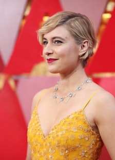 Greta Gerwig in a yellow dress at the Golden Globes