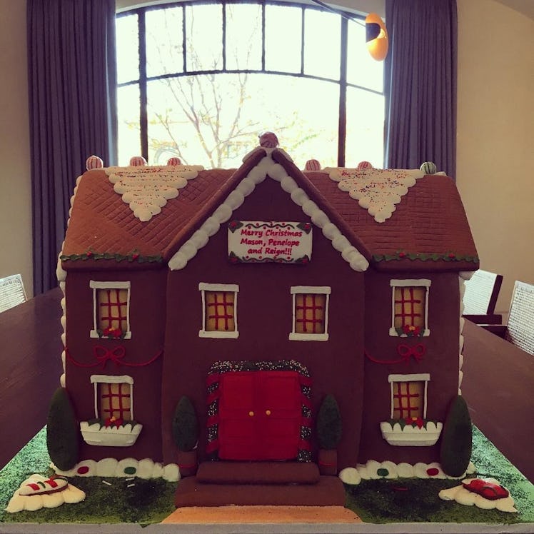A large gingerbread house at Kourtney Kardashian's house during Christmas