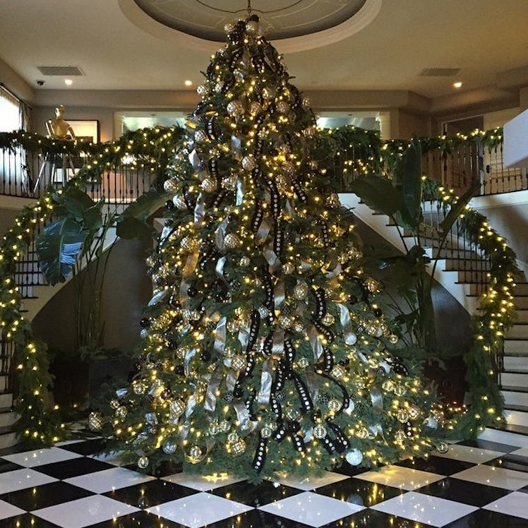 A large Christmas tree in the hallway of Kris Jenner's house