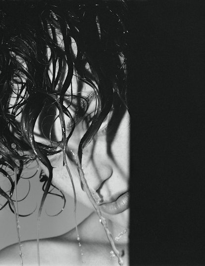 A woman with wet black hair