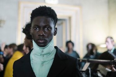 A model wearing a look from Telfar's Fall 2020 lineup at Pitti Uomo in Florence