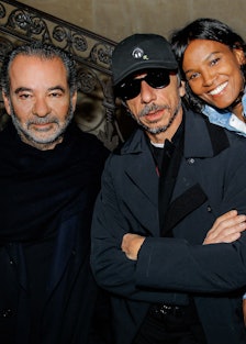 Remo Rufini posing with a man and woman at the launch of 1 Moncler Pierpaolo Piccioli at the Picasso...