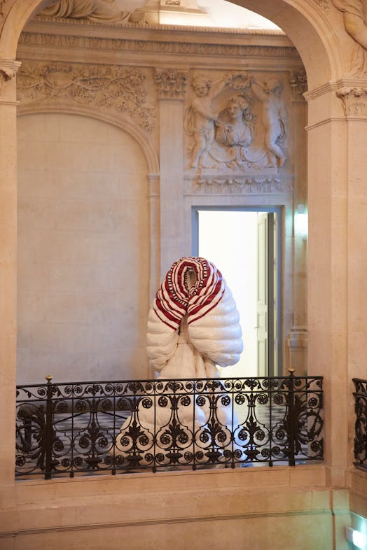 Moncler's white jacket and skirt at the Picasso Museum
