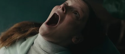 A screenshot of a Morfydd Clark as Maud screaming in the movie Saint Maud