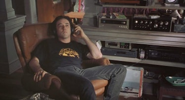 John Cusack wearing a band t-shirt in the original High Fidelity