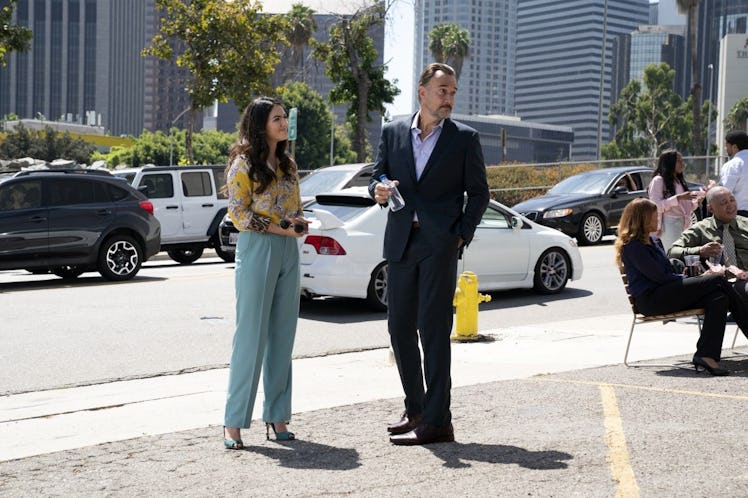 Dani (Arienne Mandi) and Rodolfo (Carlos Leal) standing in the street in *The L Word: Generation Q” ...