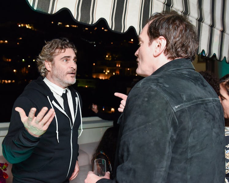Joaquin Phoenix and Quentin Tarantino speaking to each other at W Magazine’s Best Performances Party...