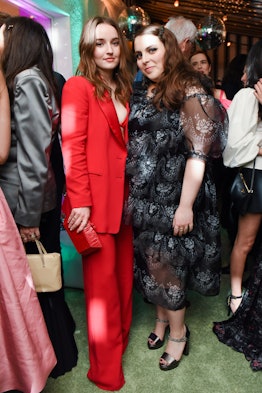Kaitlyn Dever and Beanie Feldstein standing and posing at W Magazine’s Best Performances Party