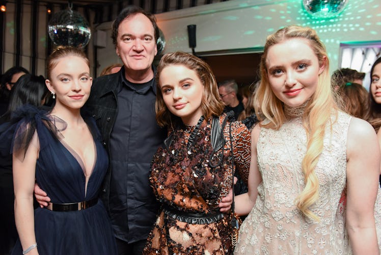 Sydney Sweeney, Quentin Tarantino, Joey King, and Kathryn Newton standing and posing at W Magazine’s...