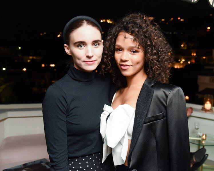 Rooney Mara and Taylor Russell posing and smiling at W Magazine’s Best Performances Party