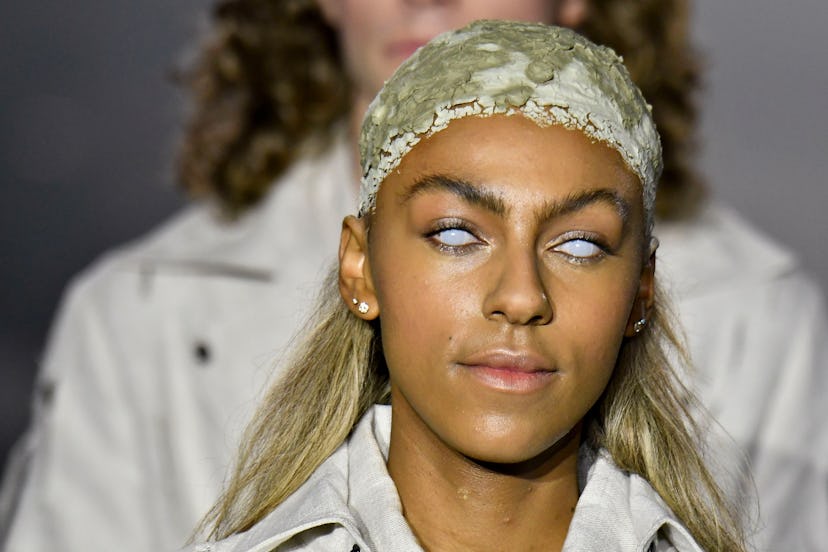 A model with Euphoria-inspired makeup walking the runway at London Fashion Week Men’s