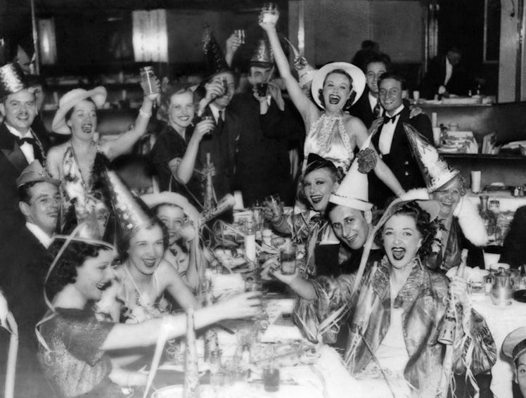 Group of people celebrating New Year’s Eve in a restaurant in New York City in 1945