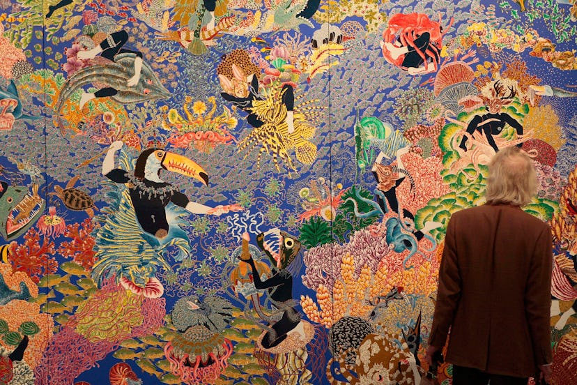 A large artwork piece by Raqib Shaw with floral elements and flowers.