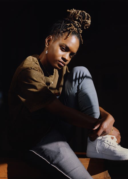 The 19-year-old Jamaican musician Koffee posing for a photo