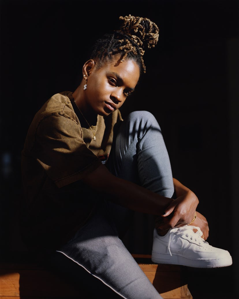 The 19-year-old Jamaican musician Koffee posing for a photo