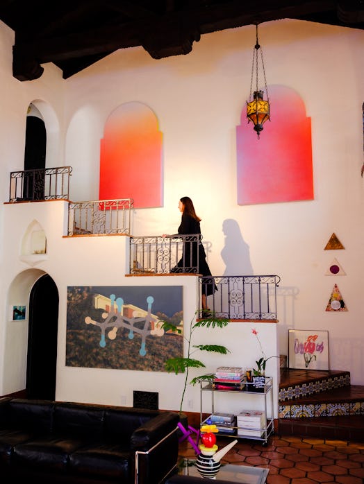 Korek, on the staircase of her Los Feliz home