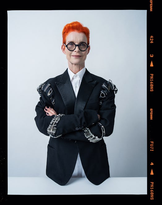 Sandy Powell posing in a jacket designed by Powell and worn by Nicole Kidman in the film How to Tal...
