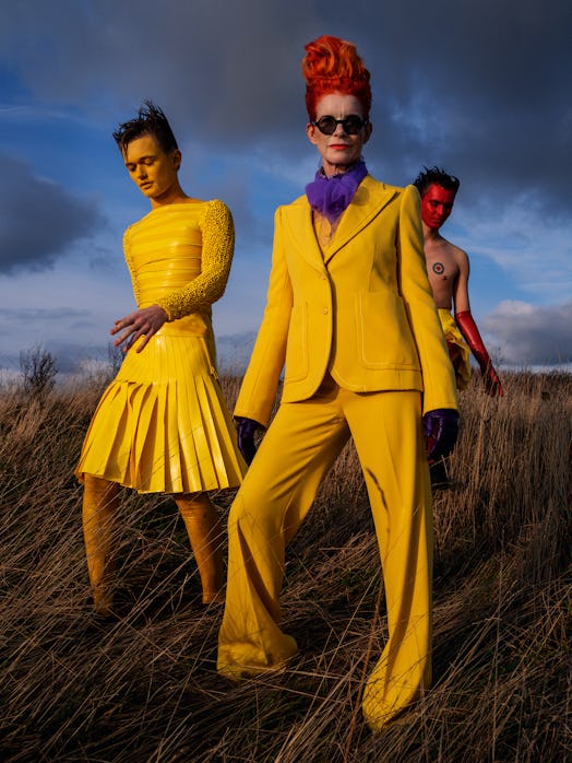 Three models wearing yellow costumes for the film How to Talk to Girls at Parties