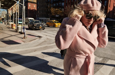 Debbie Harry in a pink Max Mara coat, pink House of Lafayette hat, pink Causse gloves and black Ray ...