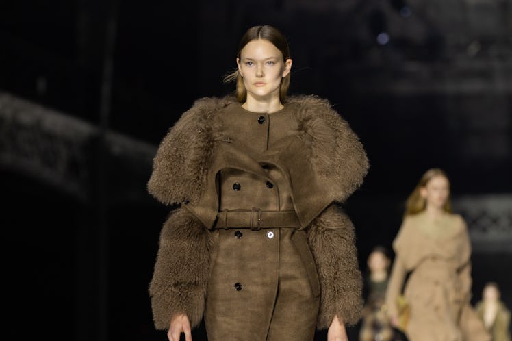 A model wearing a brown coat with fur details at the Burberry Fall 2020