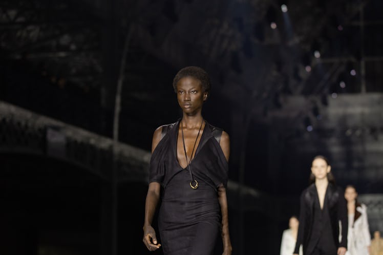 A model wearing a black dress at the Burberry Fall 2020 show