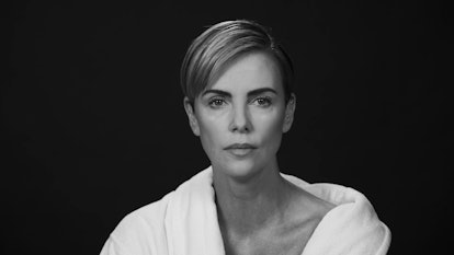 A screenshot of Charlize Theron from a video where she says reading the Bombshell script felt like a...