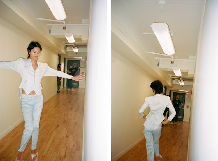 A model practicing her best ‘walk off’ during her fitting