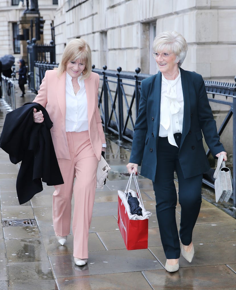 Victoria and David Beckham’s mums, wearing matching outfits at London Fashion Week
