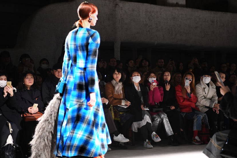 A model walking a runway