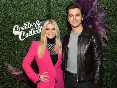 Jessica Simpson and Antoni Porowski posing together for a photo at the Create and Cultivate event