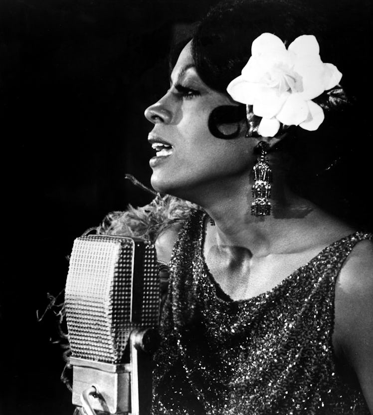 Diana Ross in a Lady Sings the Blues scene next to a microphone