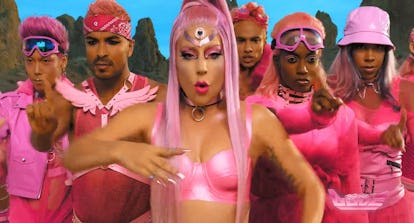 Lady Gaga and dancers wearing pink outfits in Lady Gaga’s “Stupid Love” video