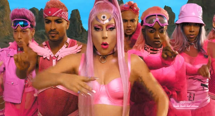 Lady Gaga and dancers wearing pink outfits in Lady Gaga’s “Stupid Love” video