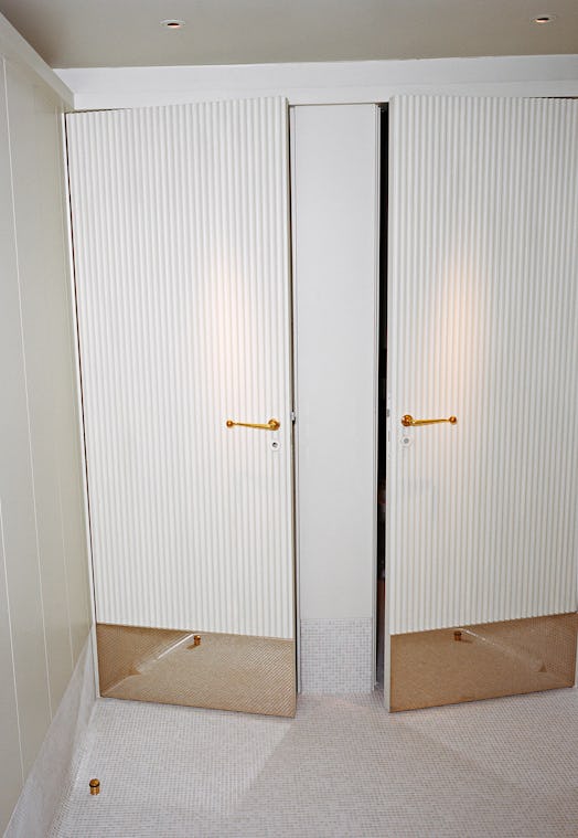 Drouant’s restroom white doors 