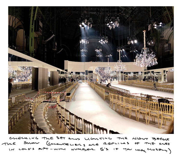 Three levels of of the Chanel runway with chairs placed for the audience