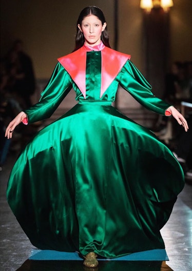 Caroline Polachek closing out Puppets and Puppets’ fall 2020 show in green silk hoop skirt