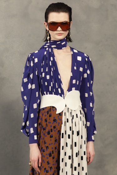 A model in a blue-white-brown geometric print dress at the Givenchy Fall 2020 show
