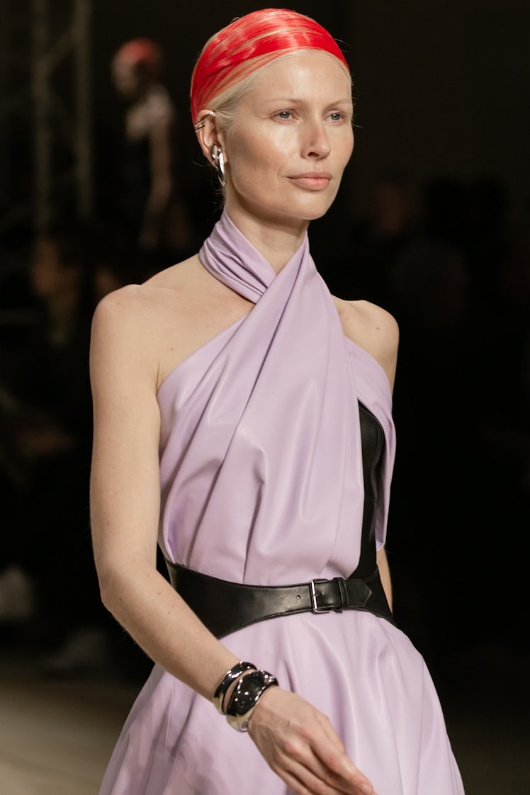 A model in a lilac-black dress at the Alexander McQueen Fall 2020 show