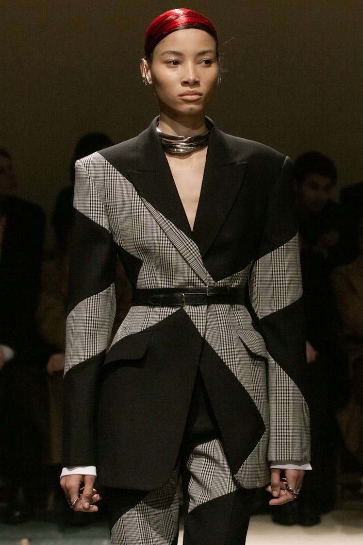 A model in a grey-black suit at the Alexander McQueen Fall 2020 show