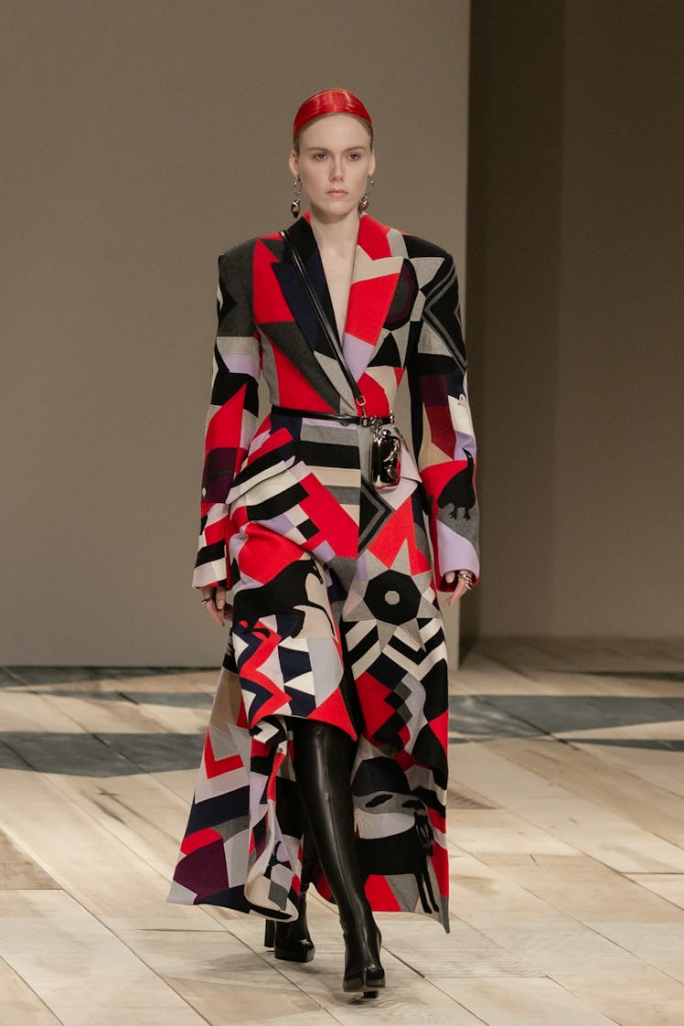 A model in a black-white-red geometric print dress at the Alexander McQueen Fall 2020 show