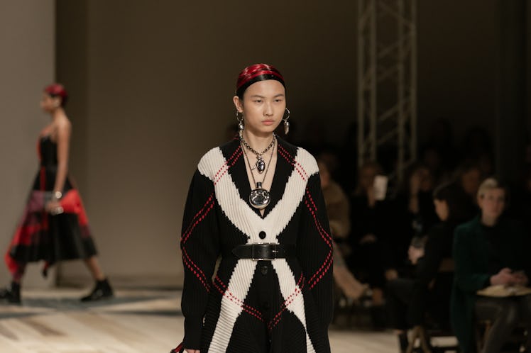 A model in a black-white-red dress at the Alexander McQueen Fall 2020 show
