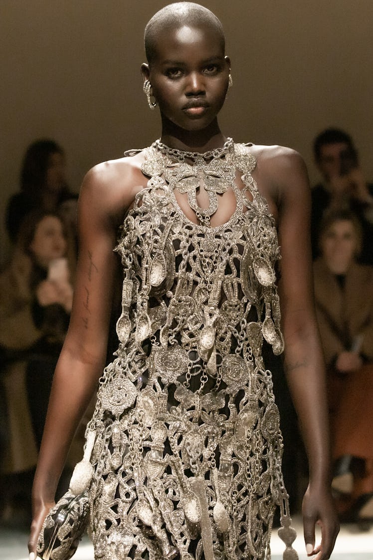 A model in a grey knit dress at the Alexander McQueen Fall 2020 show