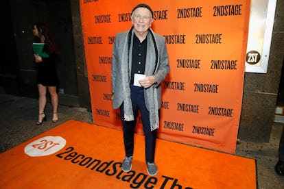 Terrence McNally on an orange carpet.