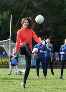 Kate Middleton playing football
