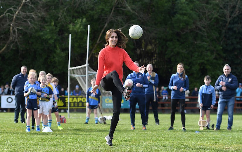 Kate Middleton playing football