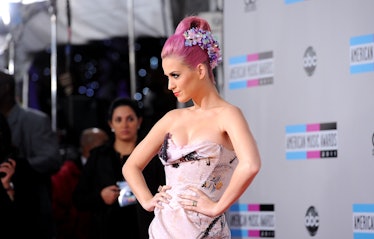 Katy Perry posing for a photo with a pink hairstyle
